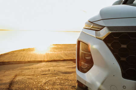 Headlight lamp of new cars,copy space. Car headlight with shallow depth of fieldの写真素材