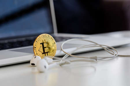 Photo Golden Bitcoins, new virtual money. Virtual cryptocurrency conceptの写真素材