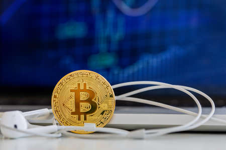 Photo Golden Bitcoins, new virtual money. Virtual cryptocurrency conceptの写真素材