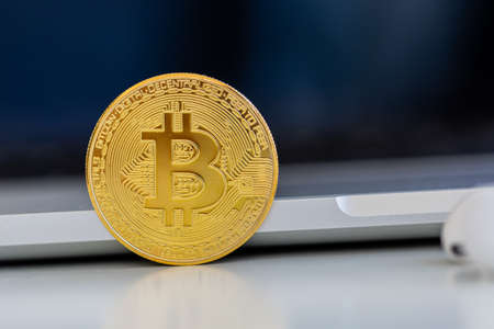 Photo Golden Bitcoins, new virtual money. Virtual cryptocurrency conceptの写真素材