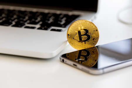 Photo Golden Bitcoins, new virtual money. Virtual cryptocurrency conceptの写真素材