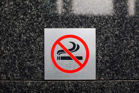 no smoking sign. The sign does not smoke on the wall.の写真素材