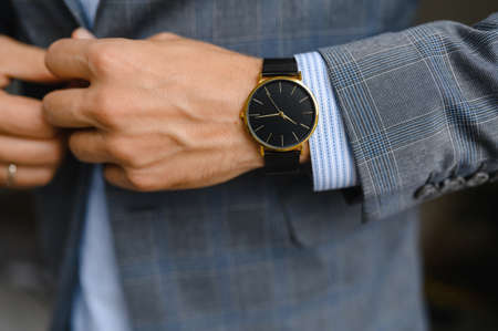 black watch, shirt, jacket. wrist shot.の写真素材