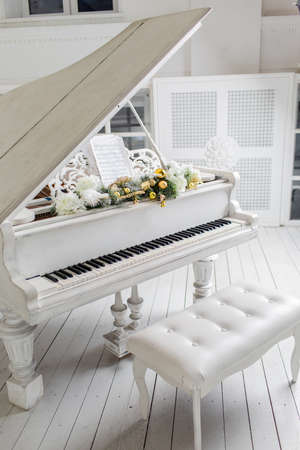 white piano in a white interior. Luxury interior の写真素材