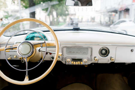 Interior of a classic vintage car. Old car. の写真素材