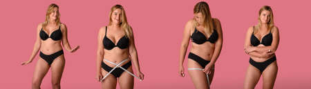 Beautiful fat girl in black lingerie on pink backgroundの写真素材