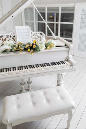 white piano in a white interior. Luxury interior.の写真素材