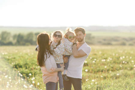 Portrait Of Happy Family In outdoor. sunsetの写真素材