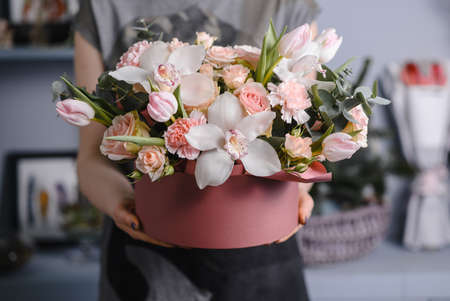 Wedding flowers, bridal bouquet closeup. Decoration made of roses, peonies and decorative plants, close-up, selective focusの写真素材
