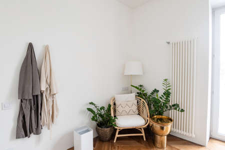 Interior of modern flat, Living room with white table, mirror.