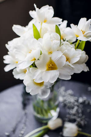 Bouquet of white tulips in vase. International Women's Day. spring flowers.