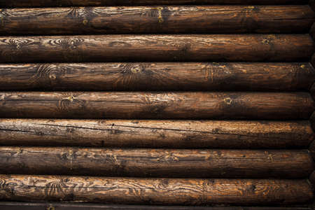 brown rustic wooden texture background. facade of a log house, copy spaceの写真素材