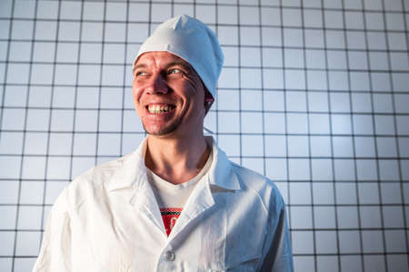 Male medical assistant in clinic. Portrait Of Young Surgeonの写真素材