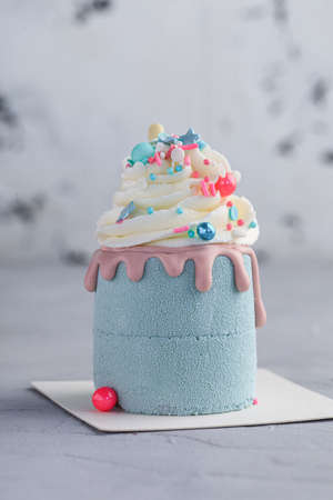 small cake on a gray background home confectionery with delivery