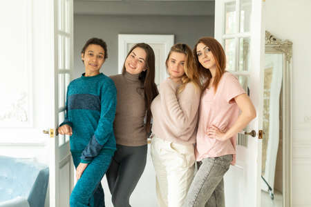A diversity of girlfriends. International friendship of girls, girls at home. body positive and people conceptの写真素材