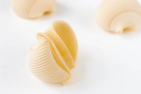 Lumaconi pasta on the white backgroundの写真素材
