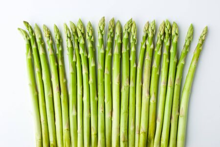 Green asparagus on the white backgroundの写真素材