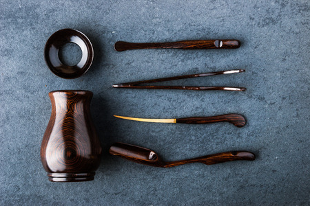 Accessories for tea ceremony on a blue table horizontal, super still lifeの写真素材