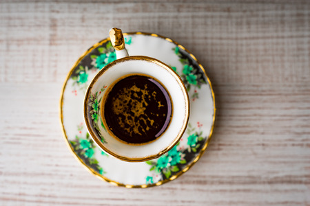 Vintage cup of coffee on the wooden table horizontalの写真素材