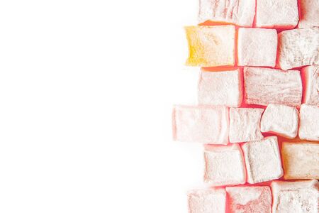Turkish delight at the right of the white background horizontalの写真素材
