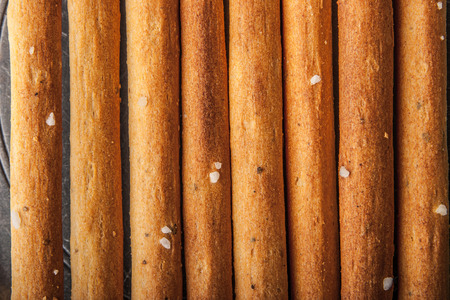 Breadsticks with salt backgroundの写真素材