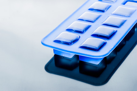 Ice cube tray with ice horizontalの写真素材