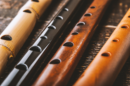 Set of flutes  on the wooden table horizontalの写真素材