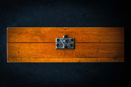 Wooden box on the dark stone tableの写真素材