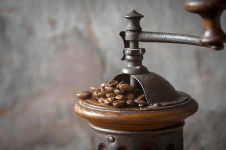 Coffee mill with coffee beans horizontalの写真素材
