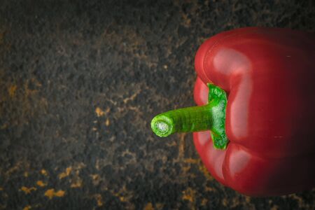 Sweet bell peppers on a metal background horizontalの写真素材