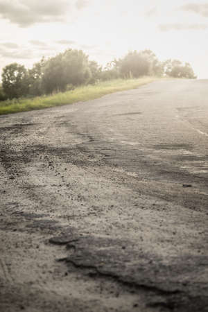 Country road going over horizon