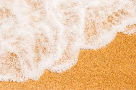 Sand  on the beach with sea wave top viewの写真素材
