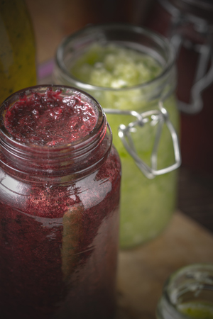 Jar with different smoothies verticalの写真素材
