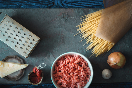 Ingredients for spaghetti with meatball on the stone background horizontalの写真素材