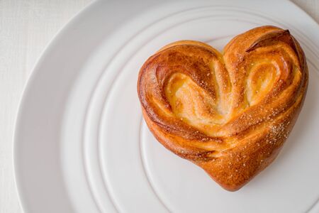 Sweet heart bun on the white plate top viewの写真素材