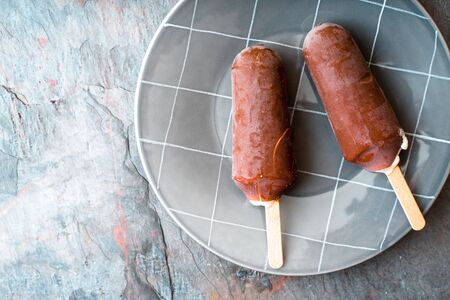 Eskimo ice cream on the stone background top viewの写真素材