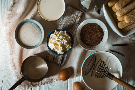 Ingredients for tiramisu on the  white wooden background top viewの写真素材