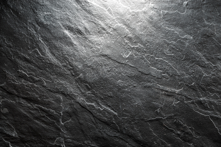 Background of a piece of black stone closeup horizontalの写真素材