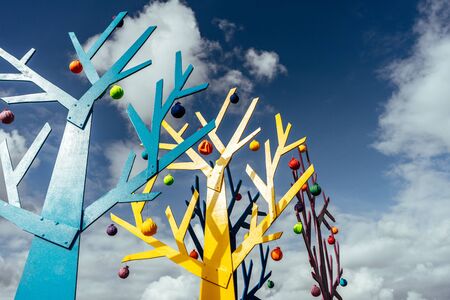 Abstract tree shape on a dark blue sky background with clouds close-upの写真素材