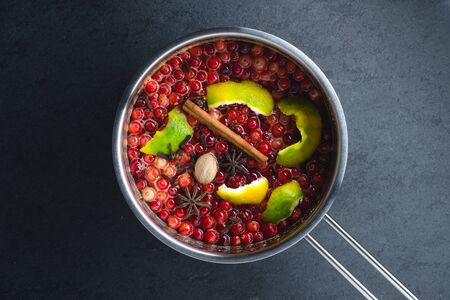 Preparation of cranberry sauce in a saucepanの写真素材