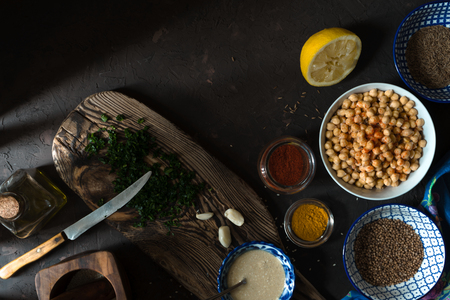 Ingredients for cooking falafel, chickpeas, tahini and spices free spaceの写真素材