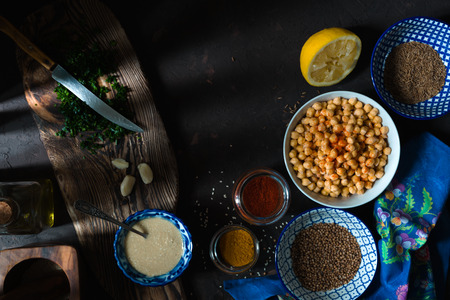 Ingredients for cooking falafel, chickpeas, tahini and spices closeupの写真素材
