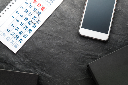 Frame from calendar, phone and gift boxesの写真素材
