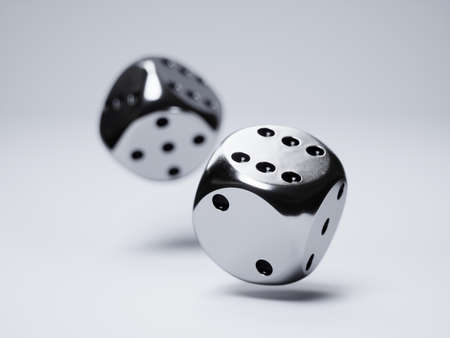 3d render of slver dices on white backgroundの写真素材