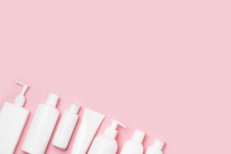 White cosmetic jars on a pink background. Cosmetics for skin care.の写真素材