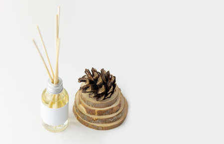 Home incense sticks with natural pine scent. Cones and spruce frame with aroma diffuser....