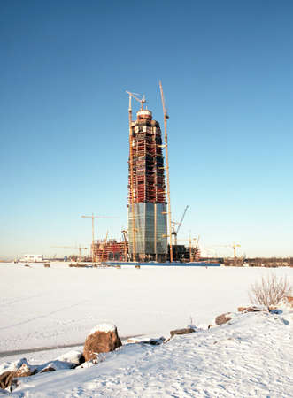 The construction of a skyscraper. A clear day, the coast of the Gulf, the construction process.の写真素材