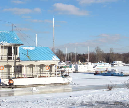 Winter, the Gulf of Finland, a pier for yachts. Clear Sky, St. Petersburg. Ships in anticipation of spring.のeditorial素材