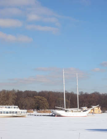Winter, the Gulf of Finland, a pier for yachts. Clear Sky, St. Petersburg. Ships in anticipation of spring.の写真素材