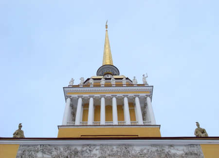 The building of the Admiralty, St. Petersburg. Yellow building with white columns, view from below, on a background of blue sky.の写真素材